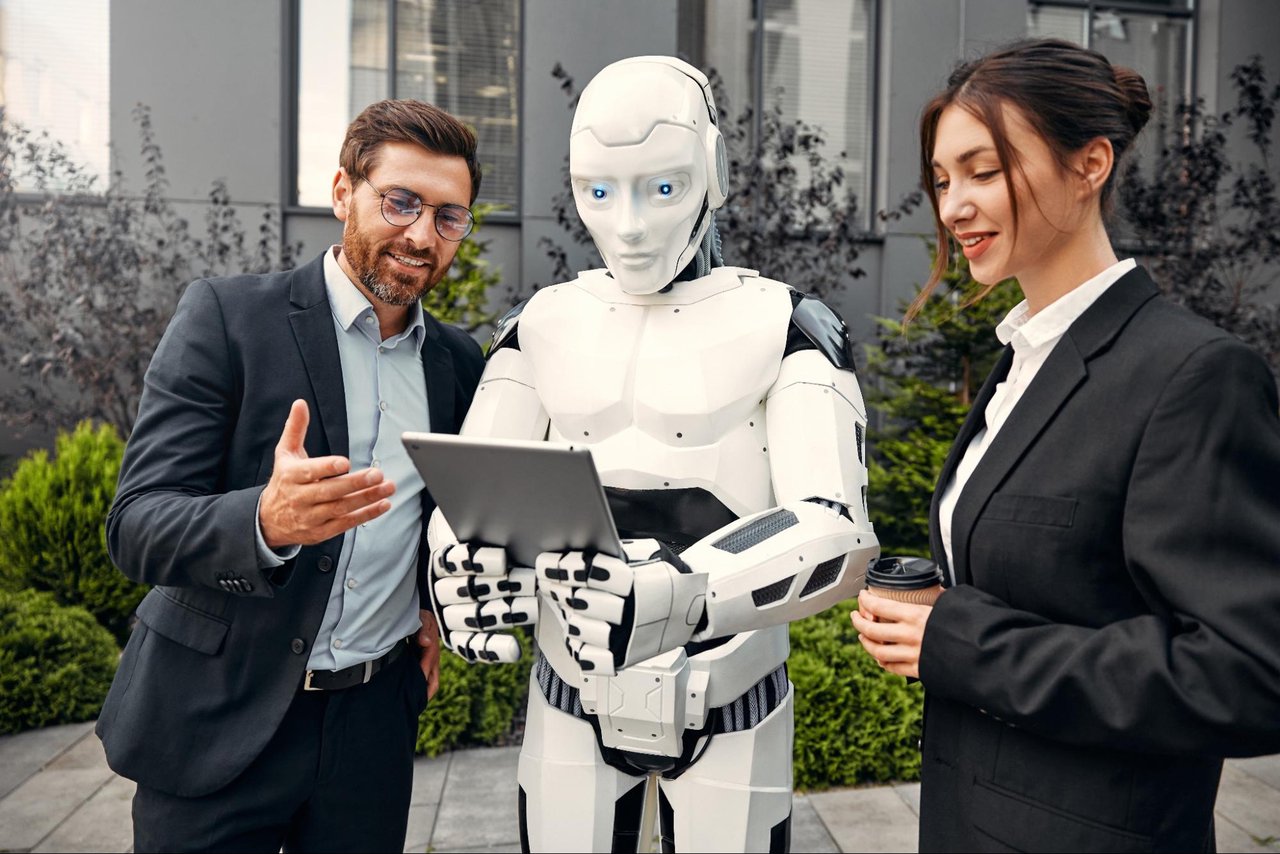 People collaborating with AI technology